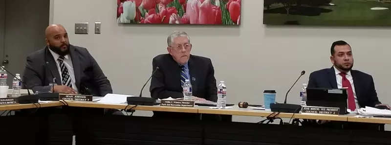 Image: Park board member Sean Johnson, left, Park and Recreation Department Director Willis Winters, center, board Vice President Jesse Moreno, right