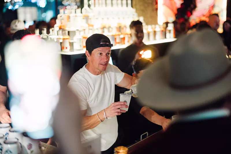 Image: Mark Wahlberg seemed right at home behind the bar in Dallas. 'I know, right, it was a catch.'