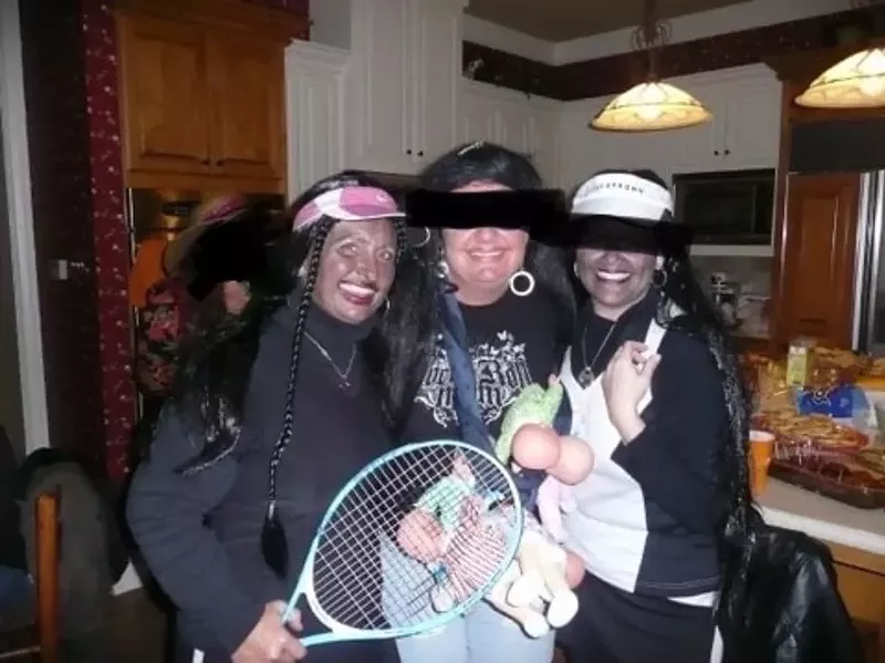 Image: Midlothian ISD Board of Trustees member Tami Tobey, left, poses with two unidentified women at a Halloween party in 2012. Tobey, who is white, and another woman wore blackface as a part of their costumes.