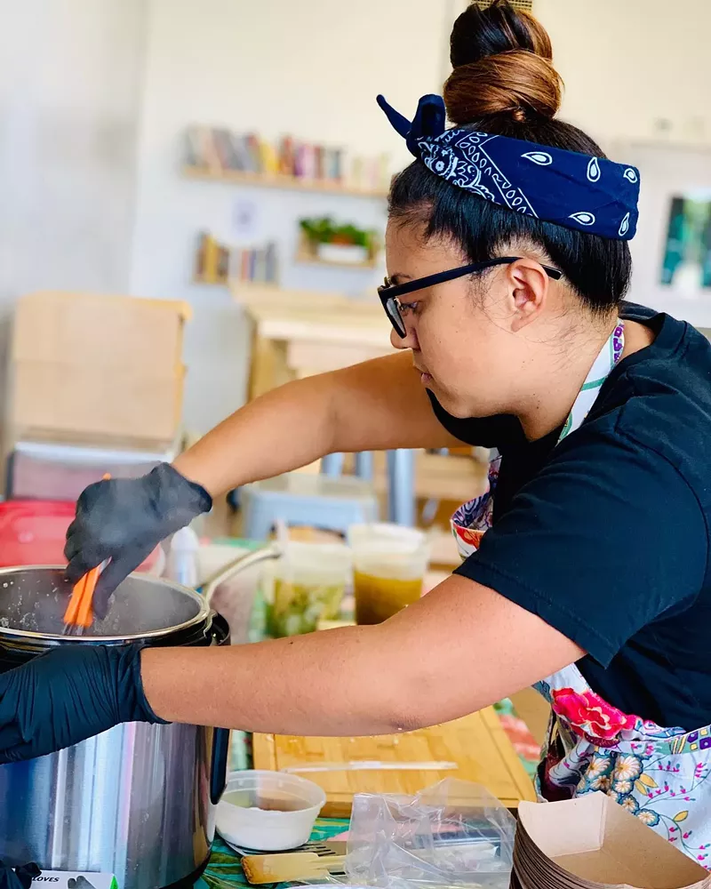 Image: Anna Swann cooks Filipino foods for her pop-up dinner.