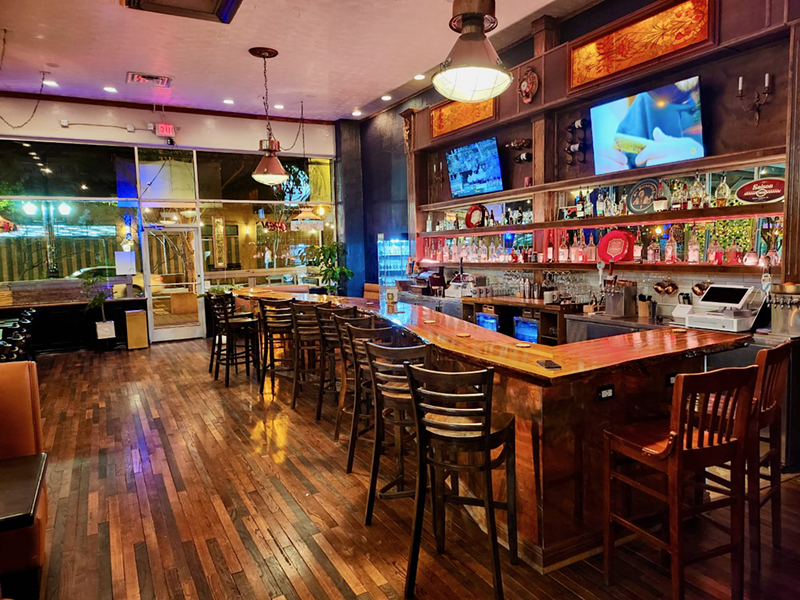 Image: The teak bar was shaped like an "M."