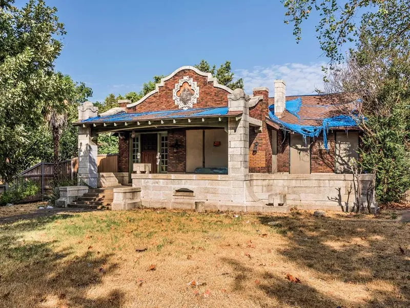 Image: After nearly 105 years, an attic fire, water damage and a revolving door of litterbug squatters have left the Bianchi House at the corner of Reiger and North Carroll avenues on the verge of collapsing.