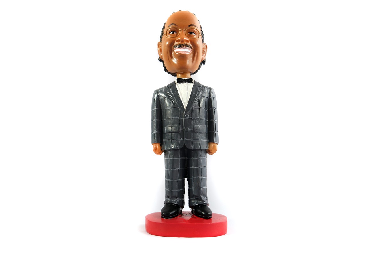 John Wiley Price's campaign sells a bobble-head figurine in his image.