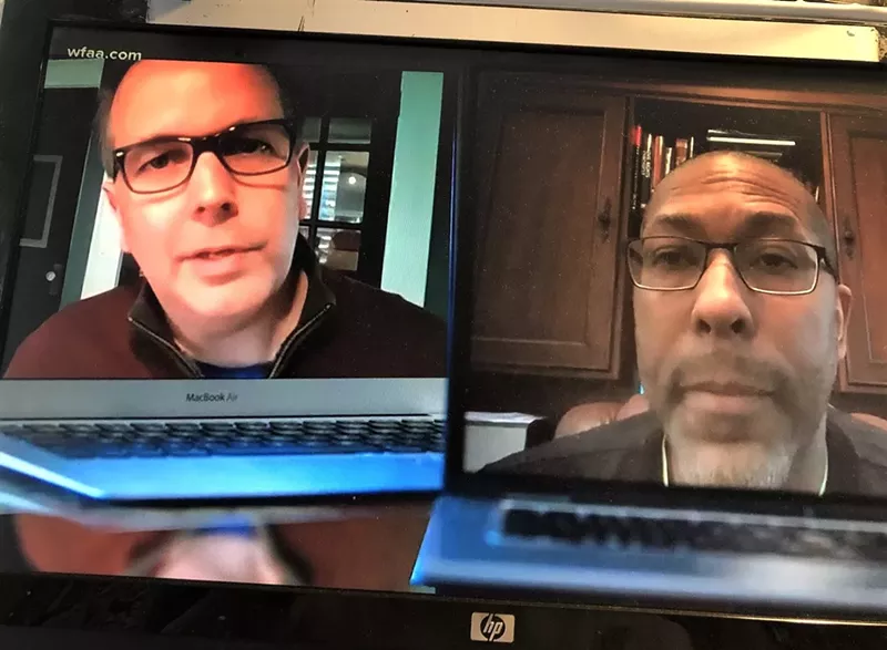 Image: Jason Whitely (left) interviews Dr. Robin Armstrong on my computer.
