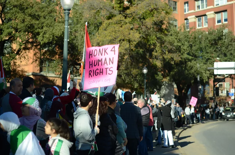 Image: Pro-Palestinian protesters march on Dealey Plaza.