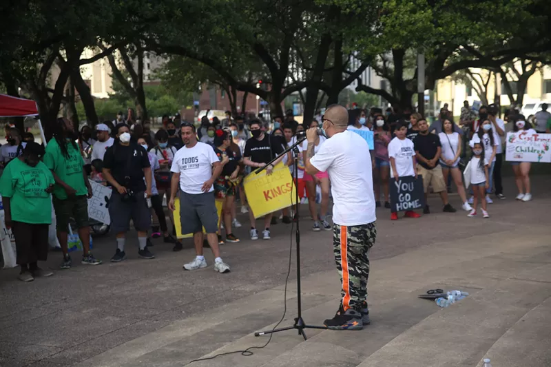 Image: Demonstrators gathered outside Dallas City Hall on Saturday to protest for immigration reform.