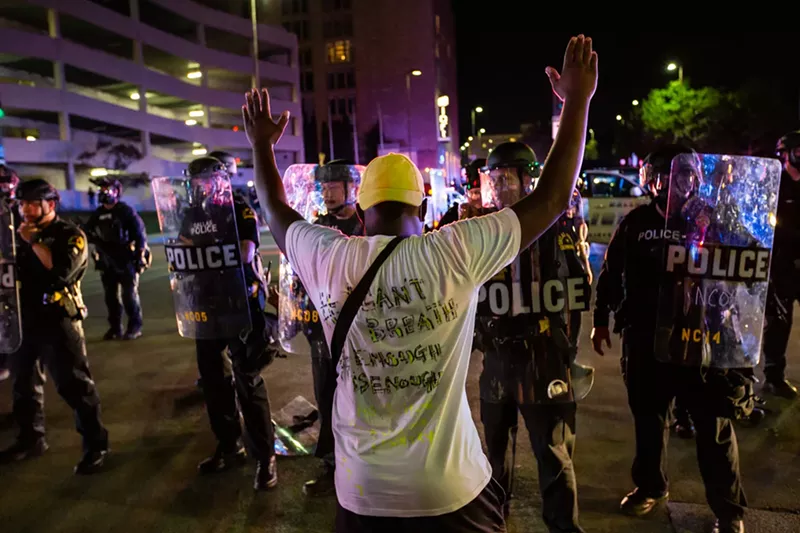 Image: Protesters clashed with police officers in riot gear Friday night and early Saturday morning in downtown Dallas.