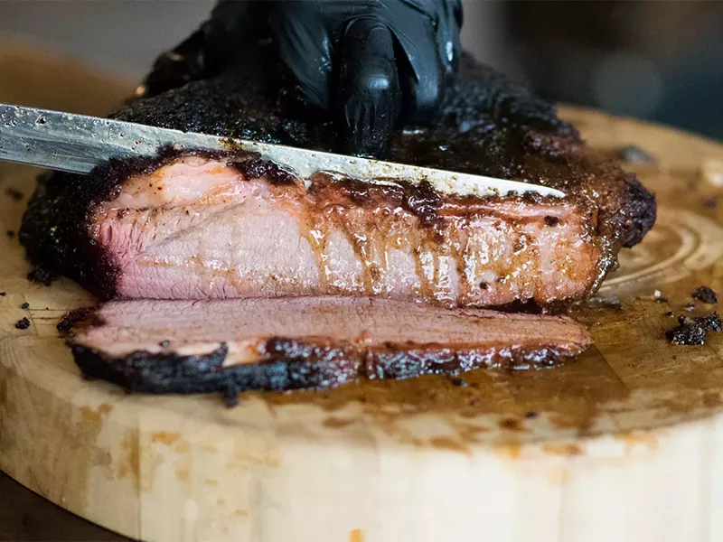 Image: Q BBQ Fest will slice up thousands of pounds of brisket this weekend.