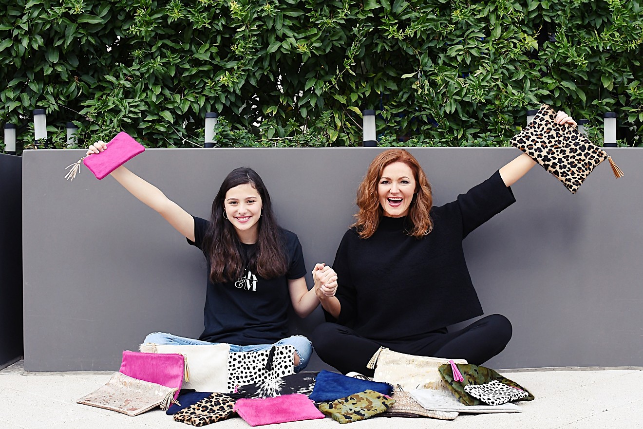 Kellie Rasberry (right), with daughter Emma Kelly, is starting a mom-daughter-and-pop business: a fashion line.