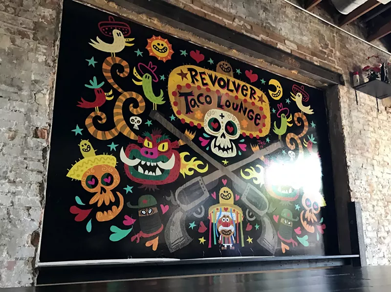 Image: The first thing you'll notice when entering the new Revolver Taco Lounge is the massive mural by Deep Ellum-based artist Jorge R. Gutierrez.
