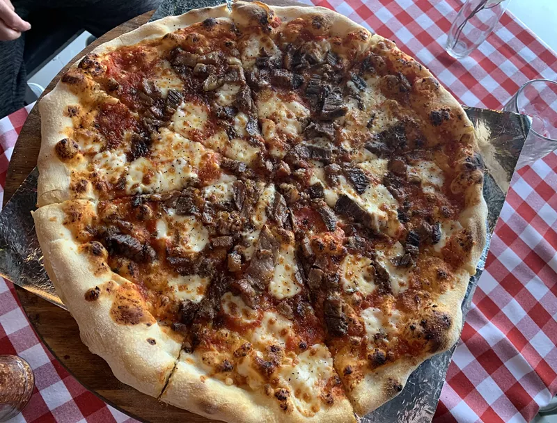 Image: The brisket pizza is Roma-TX's most crowd-pleasing pizza.