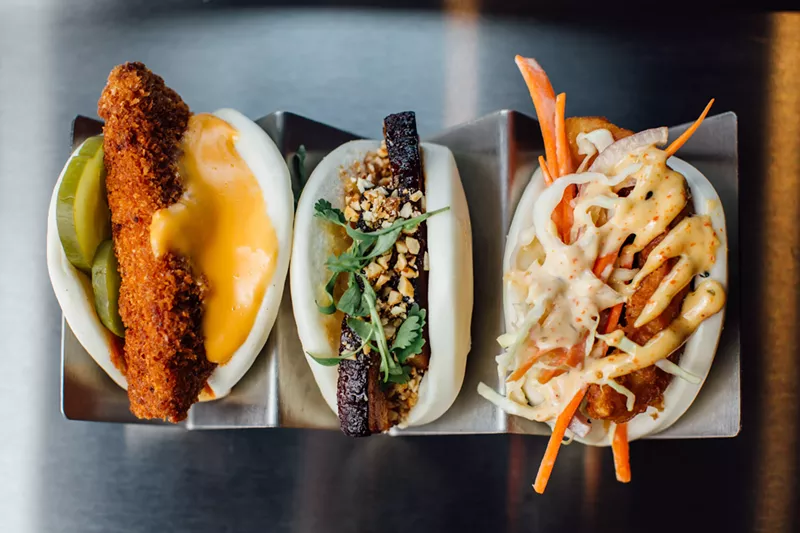 Image: From left to right: Angry bird: a take on Nashville’s hot fried chicken melted American cheese; Fish Bao: fried cod, cold slaw, tarter sauce and spicy mayo; Pork belly Bao: pork belly, Japanese mayo, peanuts, cilantro