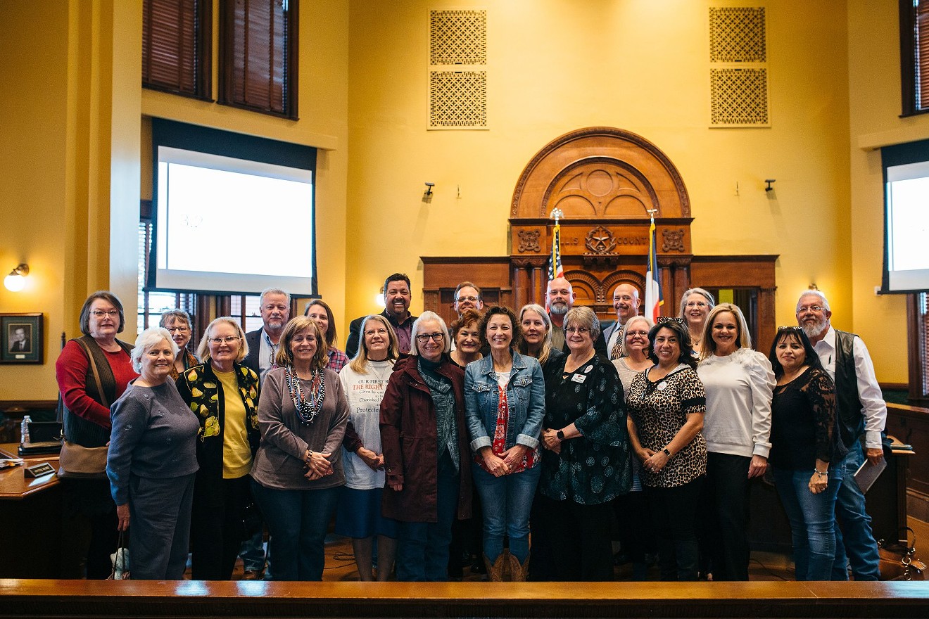 Supporters and county commissioners gather in the Ellis County Courthouse after the commissioner's court passed a resolution in support of the county becoming a sanctuary county for the unborn.