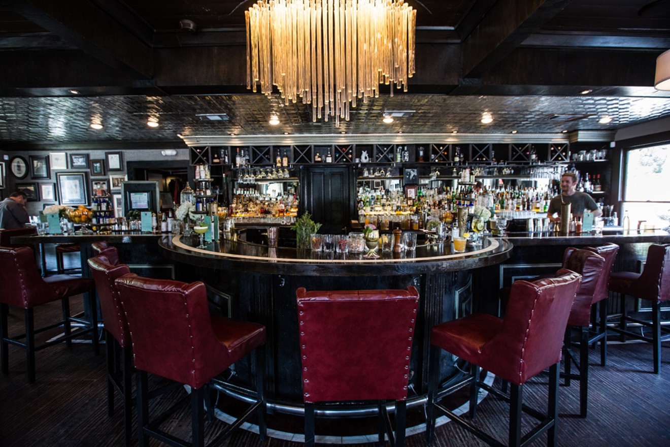 Bowen House's bar top is decorated with  absinthe fountains and antique-looking trays.