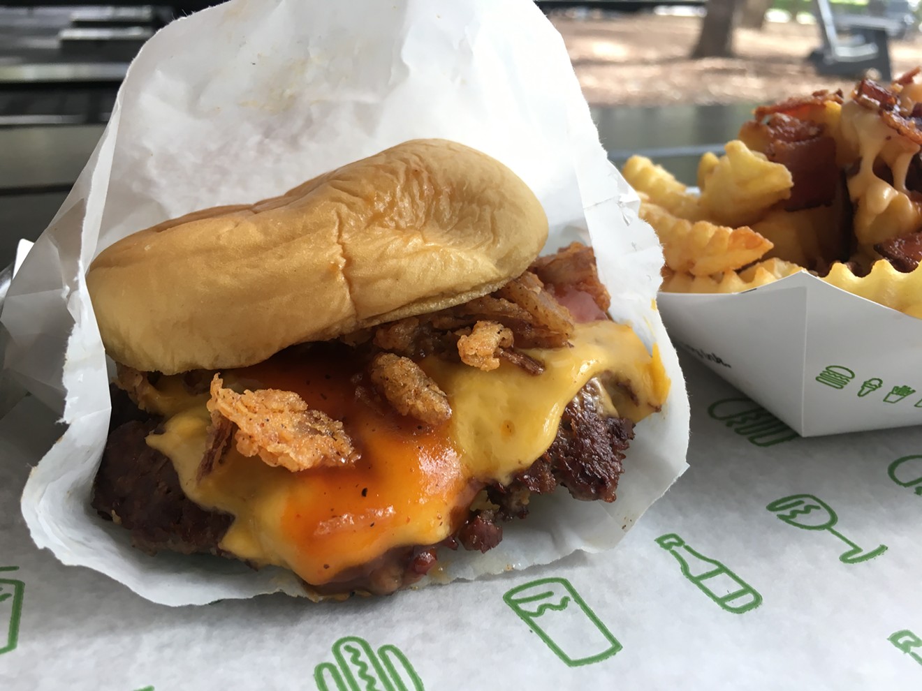 The BBQ ShackMeister Burger, with crispy, beer-marinated shallots, cheese and their new barbecue sauce. The signature soft potato roll too, of course.