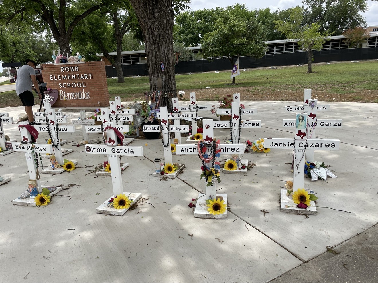 21 crosses memorialize those lost last year in the mass shooting at Robb Elementary School.