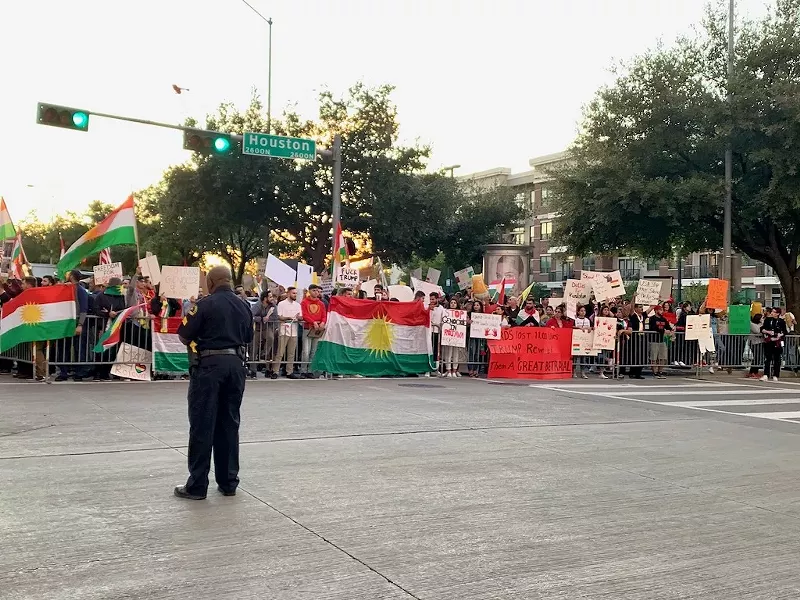 Image: Kurdish American protesters line the streets during President Donald Trump's rally last month in Dallas.