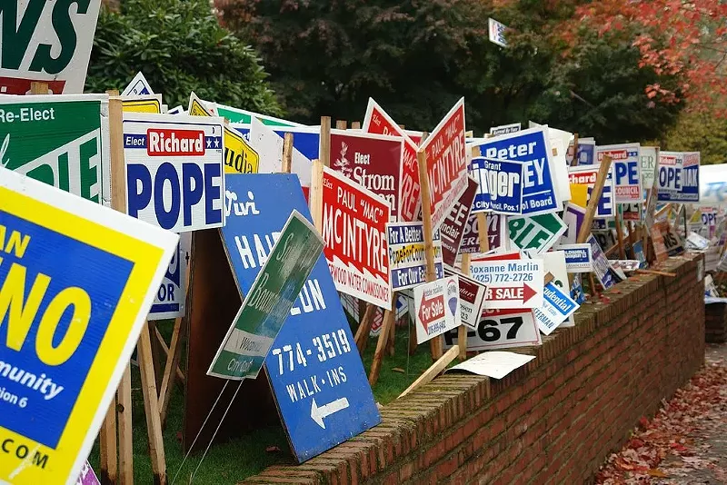 Image: Campaign signs always seem to drum up the best election drama.