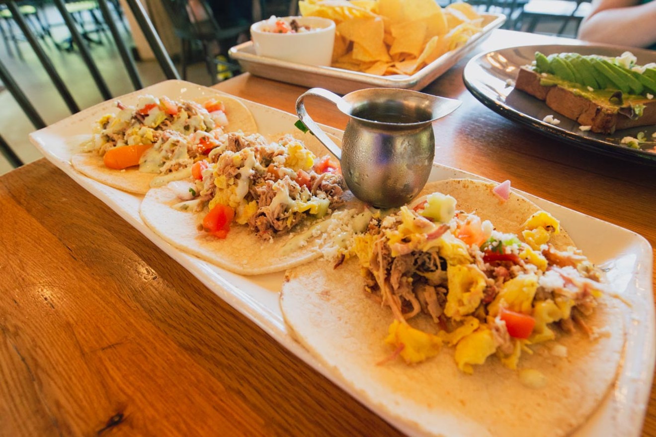 Smoky Rose's brunch tacos are quite good - but scooping on their brisket queso makes them divine.