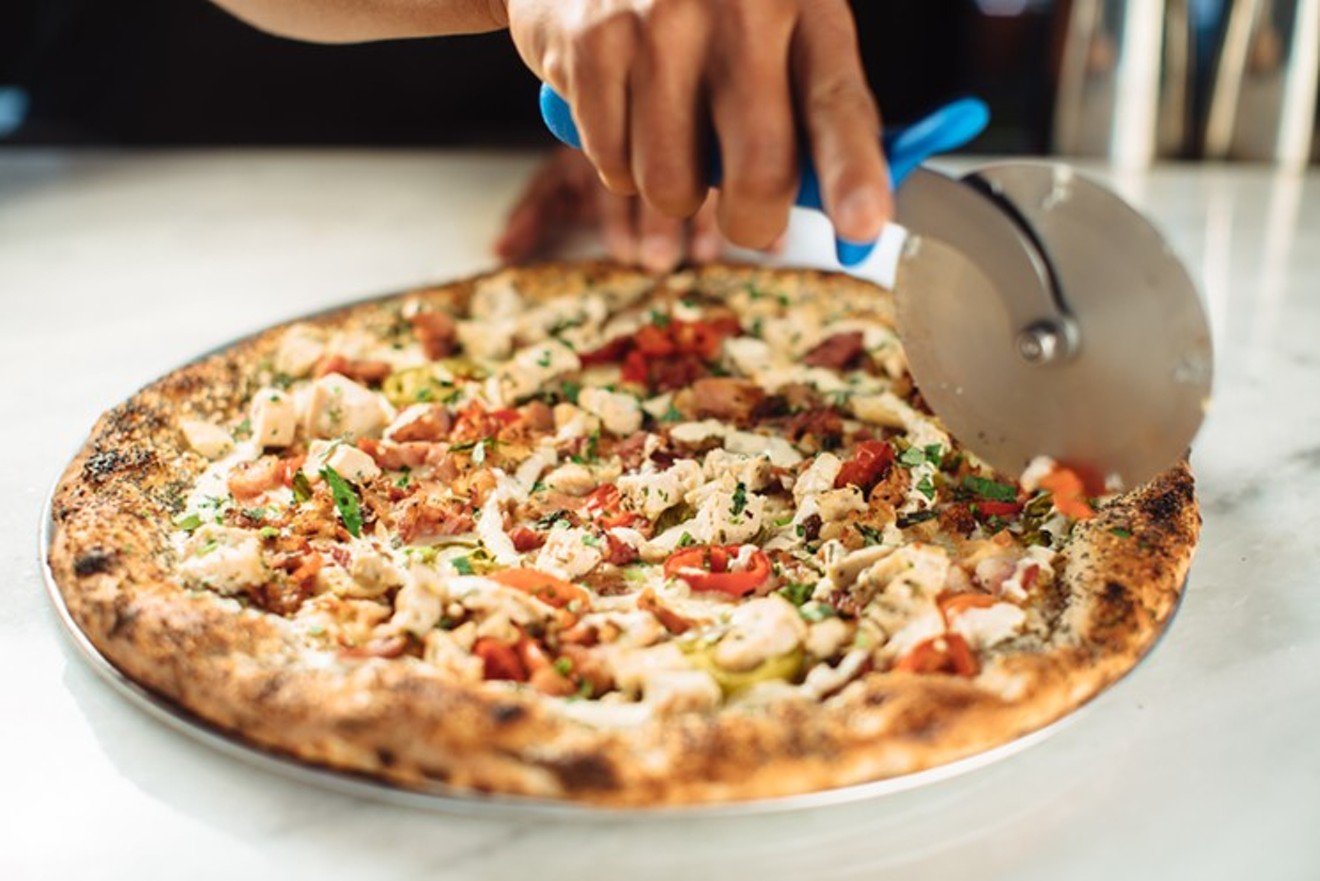Zoli's chicken bacon ranch pizza is topped with mozzarella, roasted chicken, bacon, pickled jalapeños, parsley and jalapeño ranch on an everything-bagel crust.