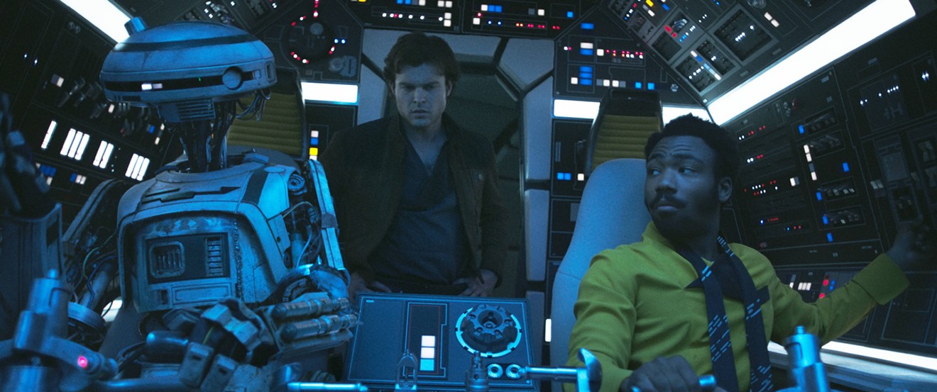 Han Solo (Alden Ehrenreich) and  Lando Calrissian (Donald Glover, right) appear alongside new droid L3-37 (voiced by Phoebe Waller-Bridge) in Ron Howard’s prequel Solo: A Star Wars Story.