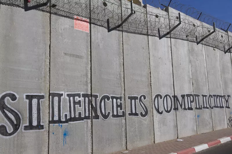 Image: The wall between the West Bank and East Jerusalem – in Texas, silence is also golden when it comes to criticizing Israel.