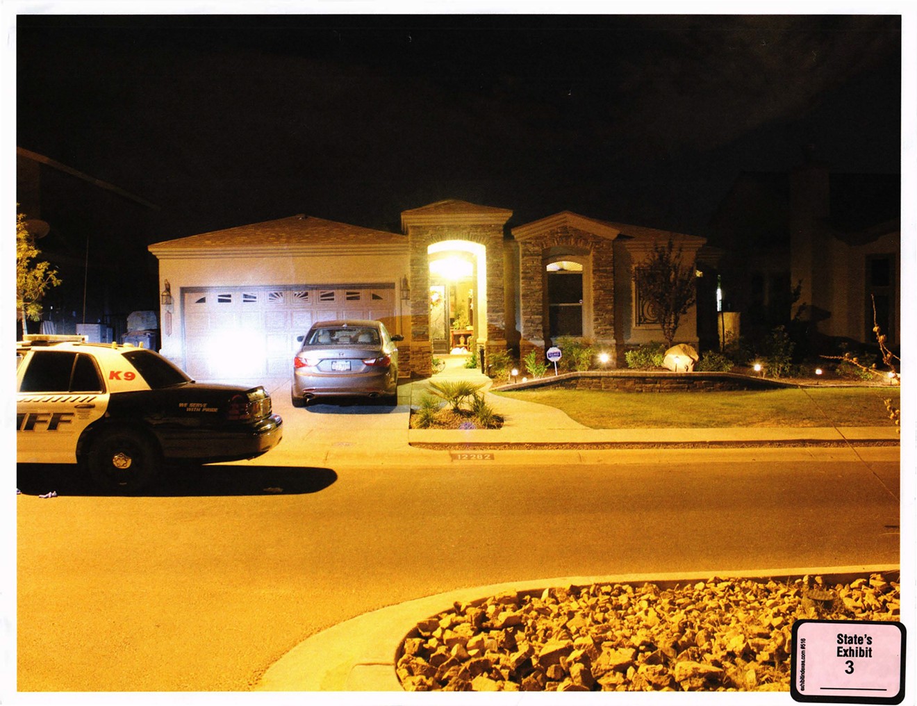 A crime scene photo shows the Apilado house on the night of the shooting.