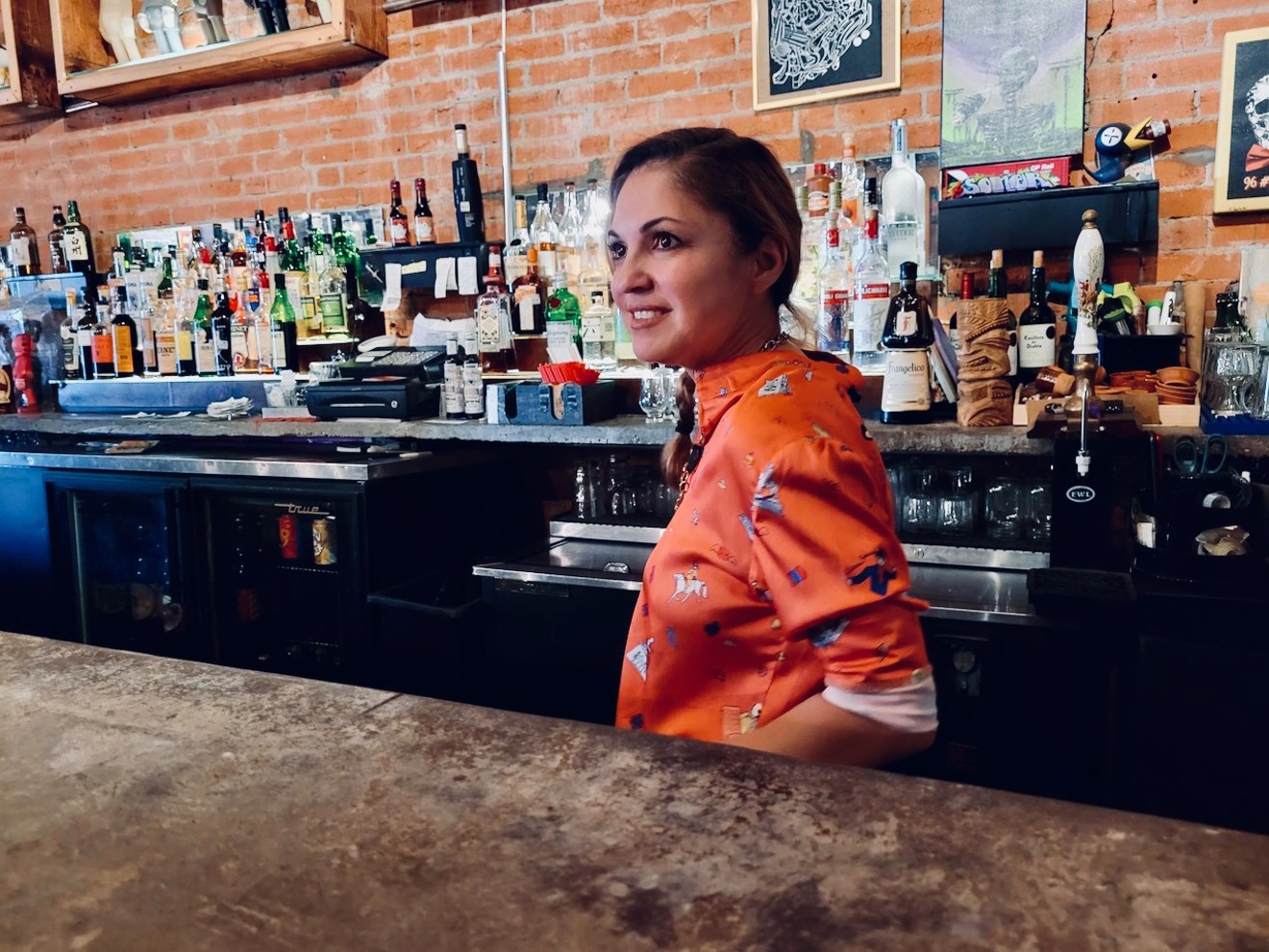 Strangeways' co-owner Rosie Ildemaro behind the bar. After 12 years in operation, the popular spot is going to court to try to remain open.