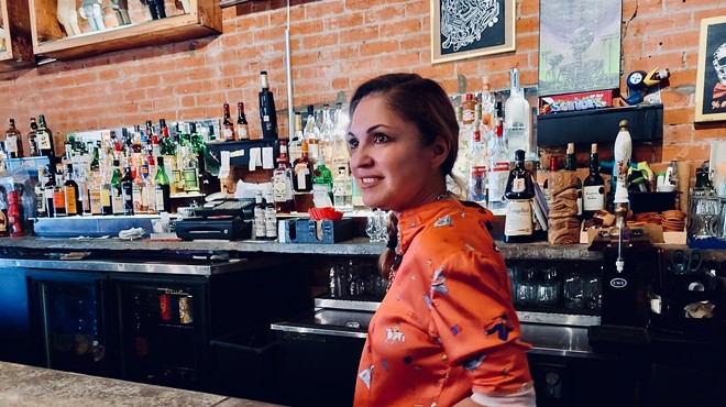 Co-owner Rosie Ildemaro stands at the bar at Strangeways, which she and her brother Eric have operated for 12 years.