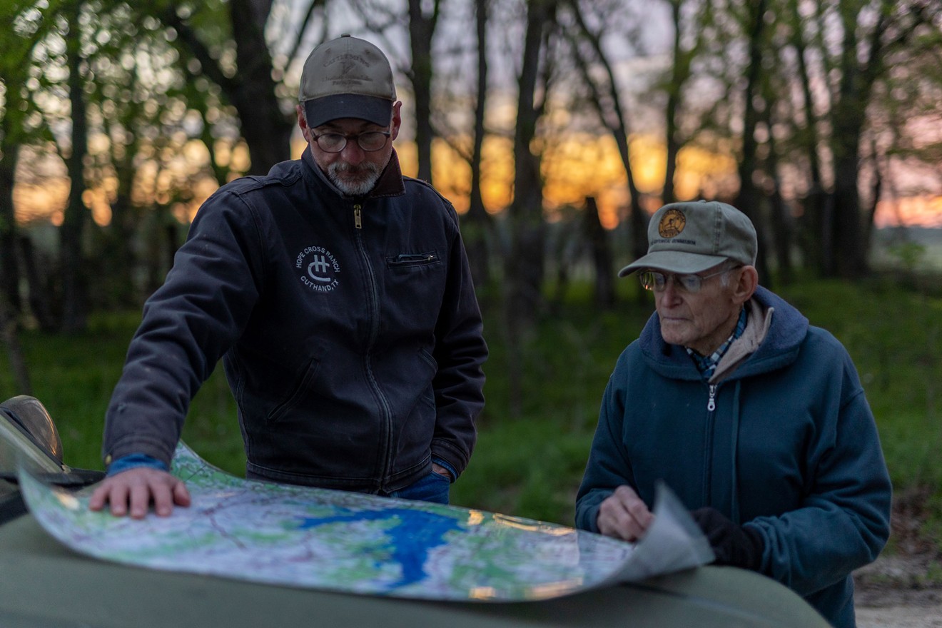 In Cuthand, Texas, Jim Marshall (left) and his neighbor Gary Cheatwood examine a map of the land the Marvin Nichols Reservoir could take.