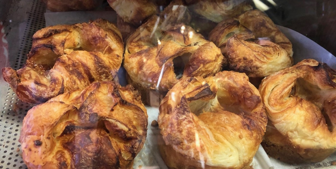 Kouign-amanns basking in the case at Swiss Pastry Shop