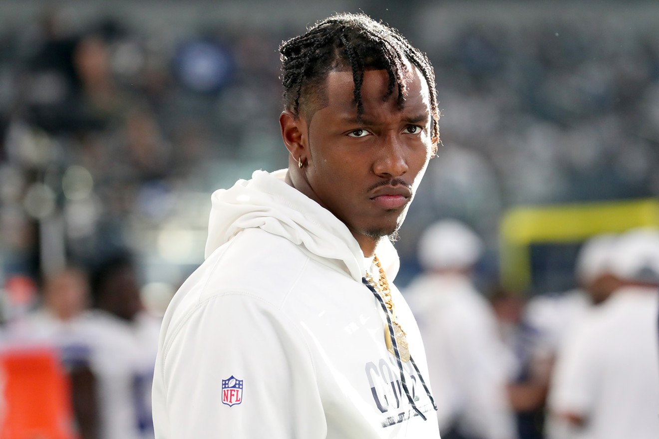 Taco Charlton stands on the sidelines during the Cowboys' Week 1 victory over the New York Giants.