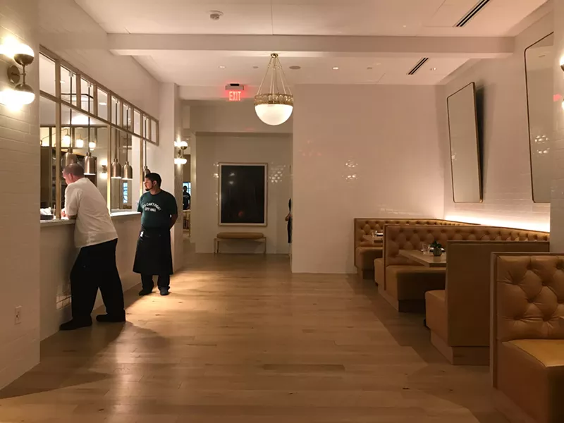 Image: The new City Hall Bistro at the Adolphus has an open kitchen and several dining areas.