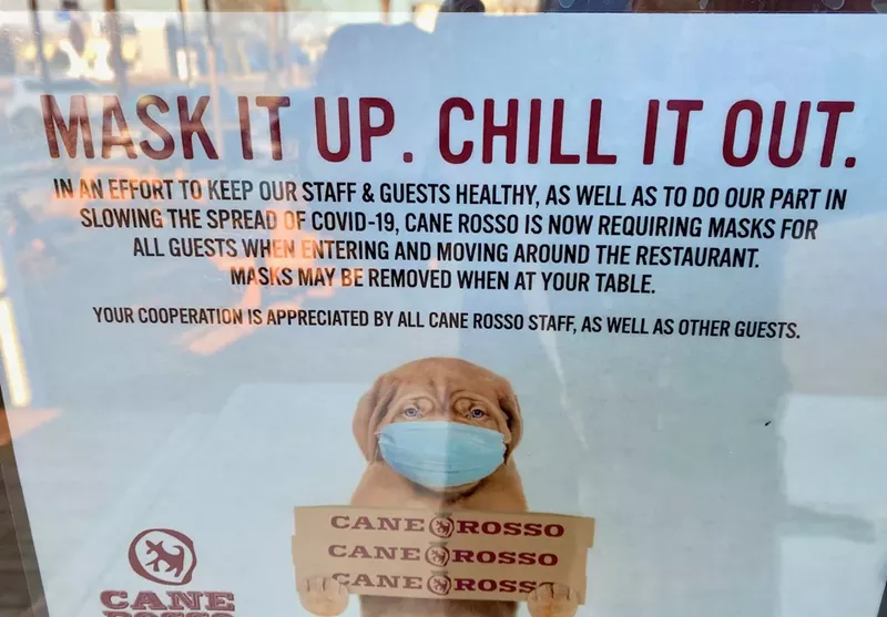 Image: A sign posted at Cane Rosso in Arlington prior to the governor's rescinding the mandate. We reached out to Cane Rosso for an update and they haven't decided what their policy will be moving forward yet.