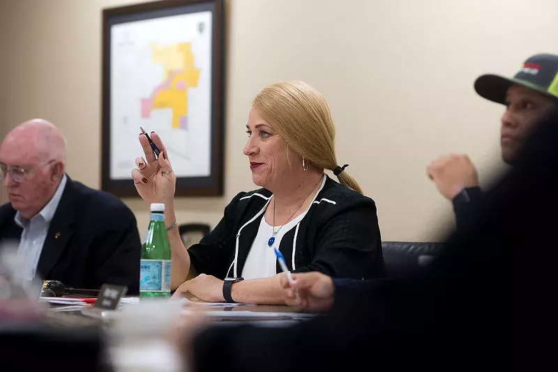 Image: Mayor Jess Herbst presides over the New Hope City Council meeting.