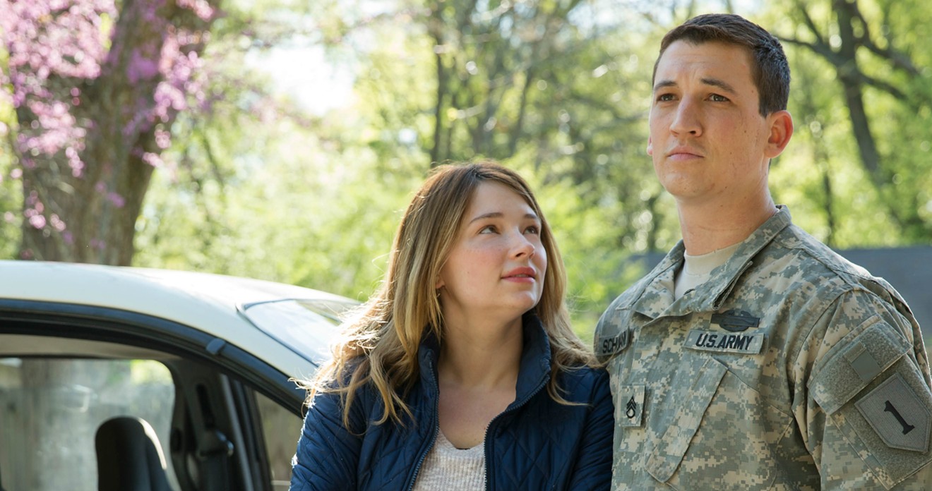 Miles Teller (right) plays Sgt. Adam Schumann, a discharged solider bringing the war back home, and Haley Bennett is his wife Saskia, trying to make it all better, in Thank You for Your Service.