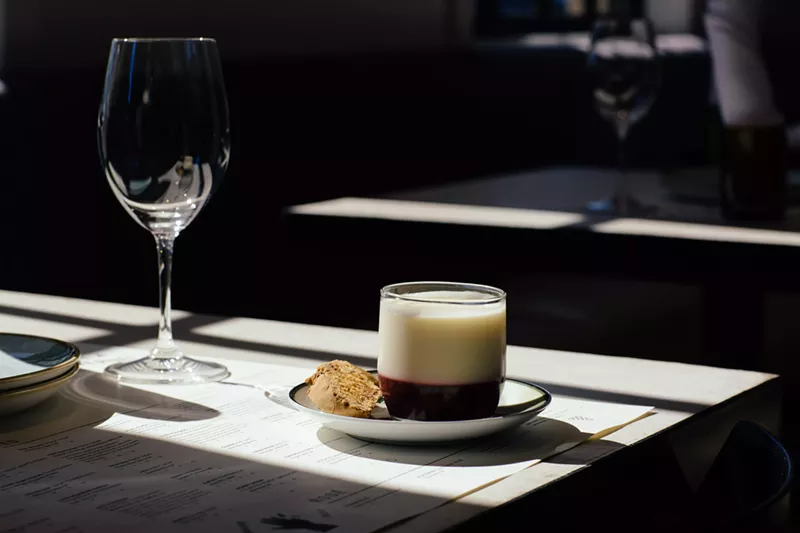 Image: Hey, wait a minute. Our glass is empty. Good thing we're at Sixty Vines.