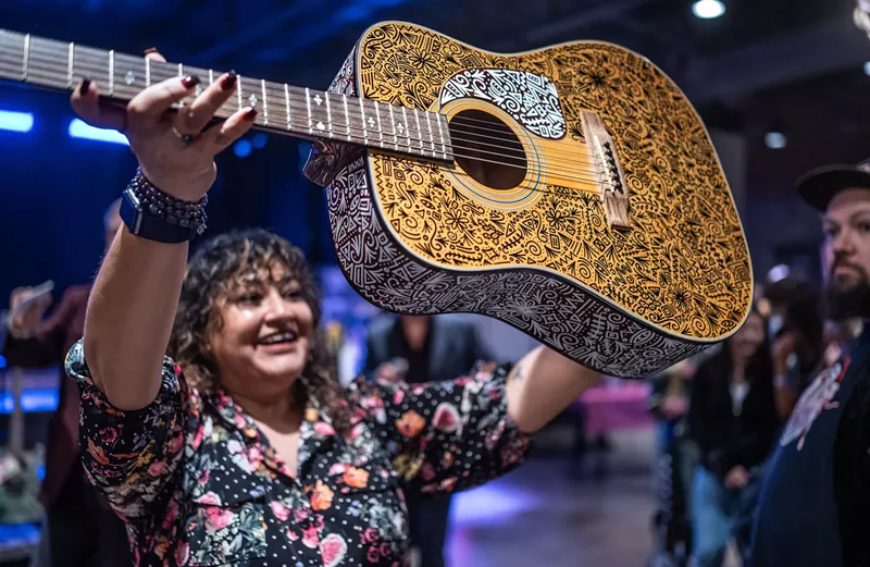Image: Art of the Guitar 2023 auctioned off guitars donated by artists such as Jaret Reddick and decorated with art by Booker T. students.