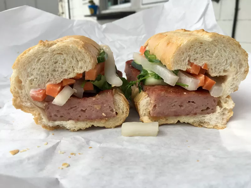 Image: The garlicky pork banh mi features a sausage patty that's ground in house for $9.