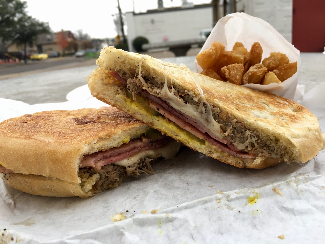 A Cubano with mojo pork, ham, melted swiss, pickles and mustard is $8.