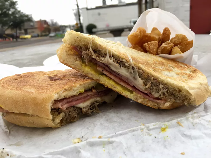 Image: A Cubano with mojo pork, ham, melted swiss, pickles and mustard is $8.