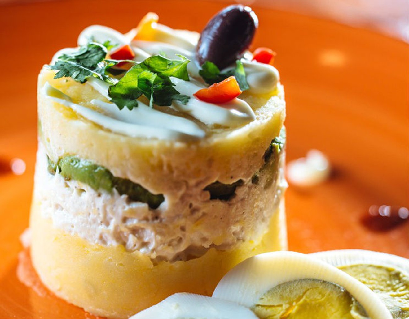 The causa limena at Lima Taverna, a new Peruvian restaurant in Plano, is a layered seafood and potato salad.