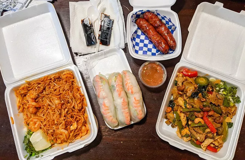 Image: Ly Food Market's pad Thai, shrimp spring rolls, pad kee mao and Lao sausages, all for a total of $31 (plus generous tip).