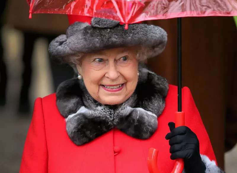 Image: The expression "Yasss queen" probably came about because the late Queen Elizabeth II matched her umbrella to her clothes.