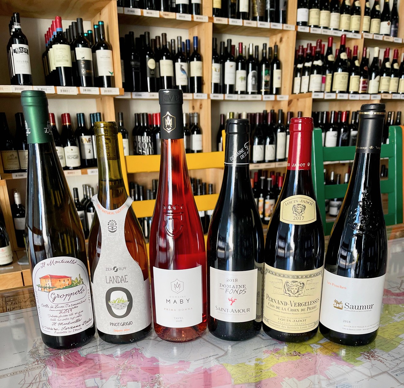 Wines lined up in a nice little row at Le Caveau might feel intimidating in an overwhelming joy kind of way, but with just a little guidance, all this can be yours.