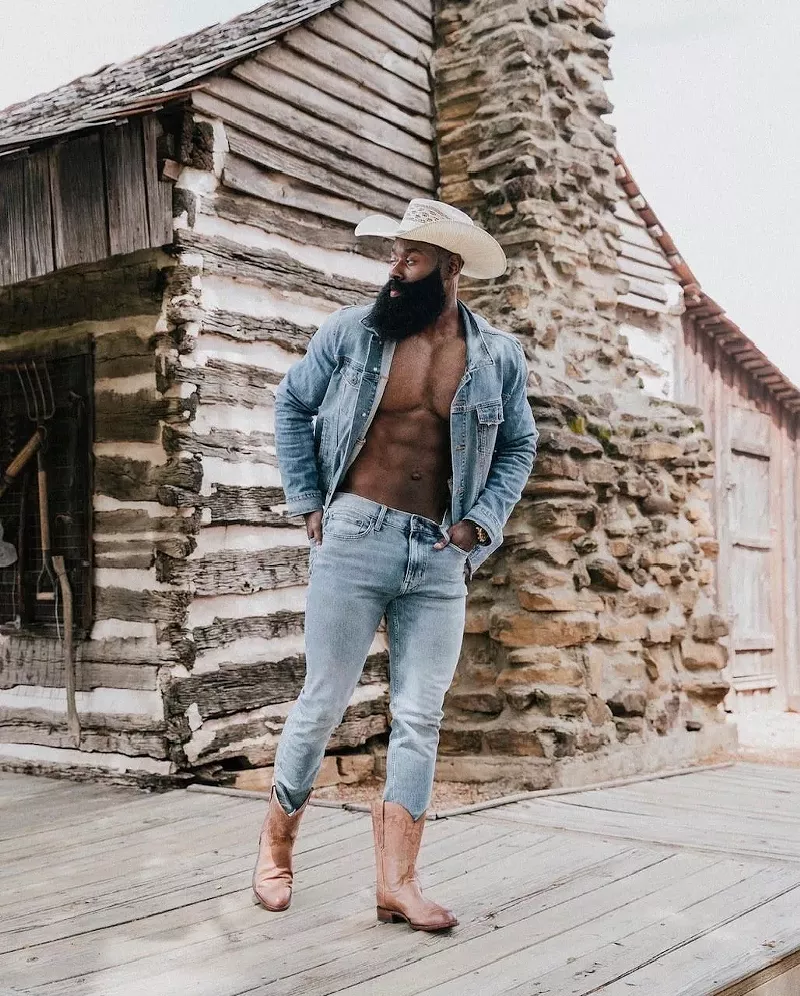 Image: Men’s fashion influencer and Wilhelmina model Queyoun Makor in denim, cowboy boots and Stetson.