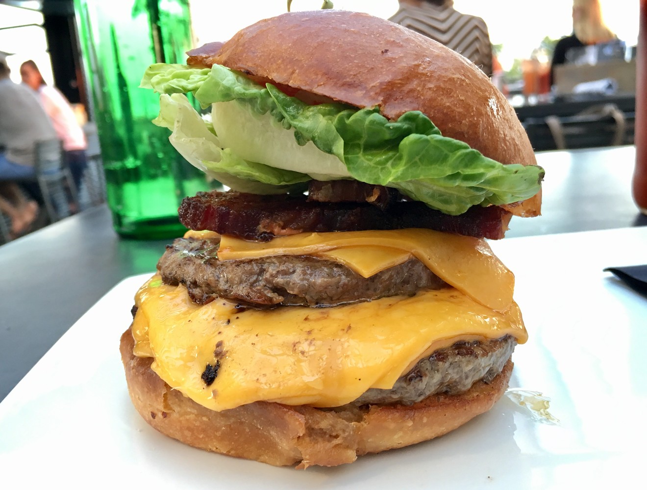 The double cheeseburger has two slices of American cheese per patty and "steak bacon" (Duroc pig) for $16. You can add a lobster tail for $8.