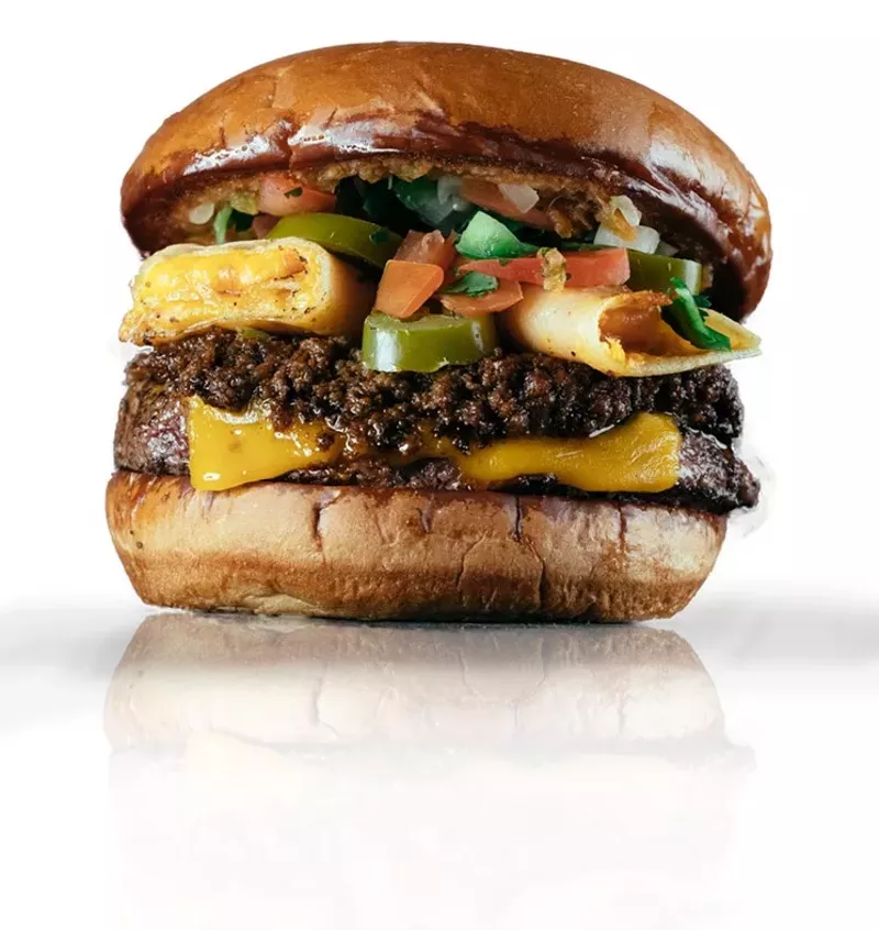 Image: Blues Burger pro-tip: try the Santana Burger, a current special made with a chile con carne-loaded cheese enchilada.