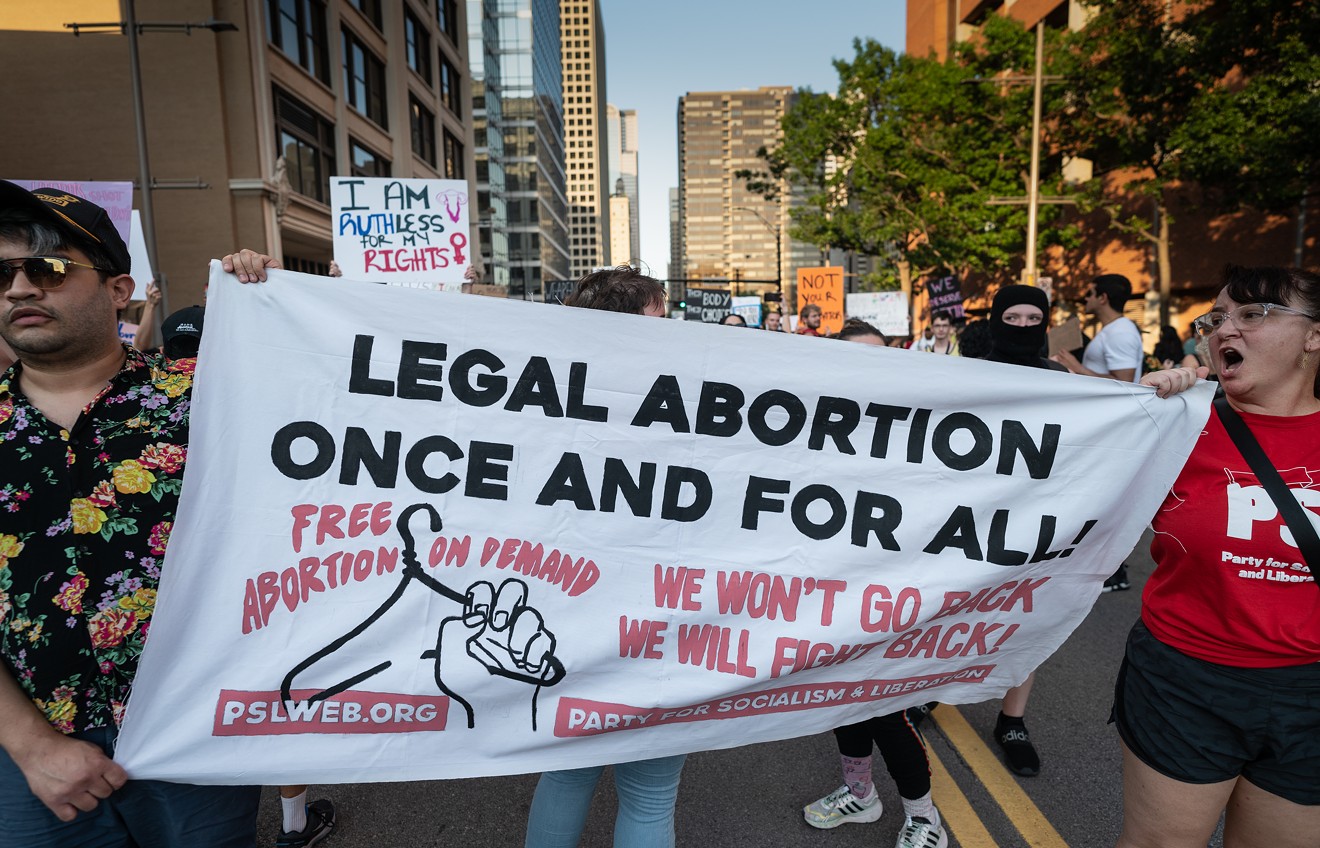 Activists protest the Supreme Court's decision to overturn Roe v Wade in downtown Dallas on June 24, 2022.