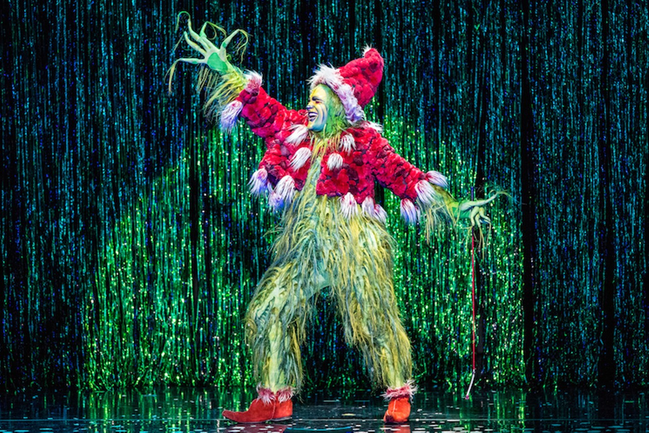 The Grinch (Philip Bryan) performs "One of a Kind," a Vaudeville number.